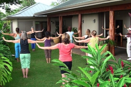 Martha teaching a class in hawaii to a group of students