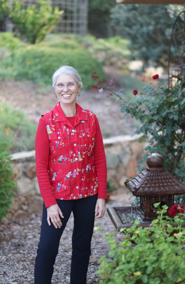Martha standing outside of her studio