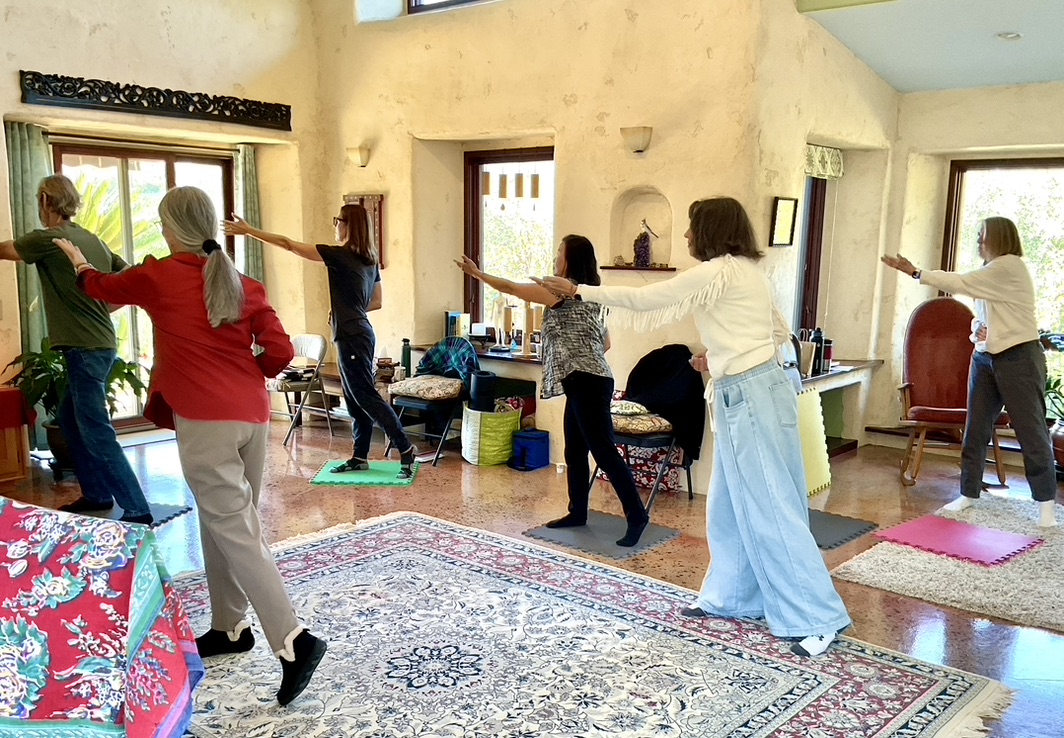 Martha leading a qigong class